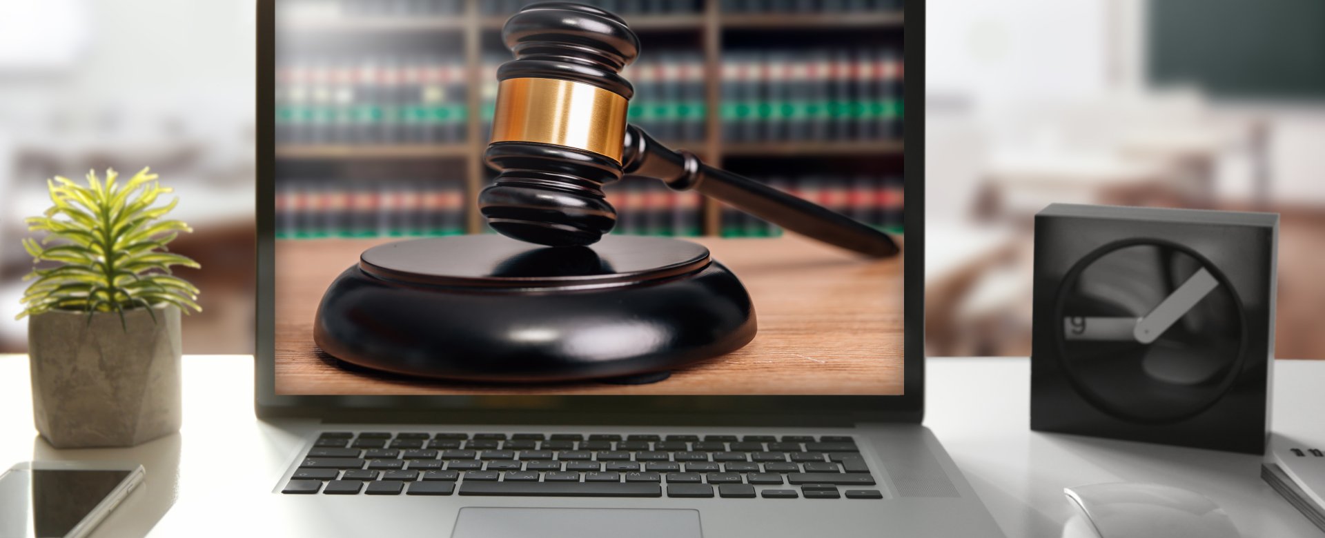 image of gavel on laptop computer